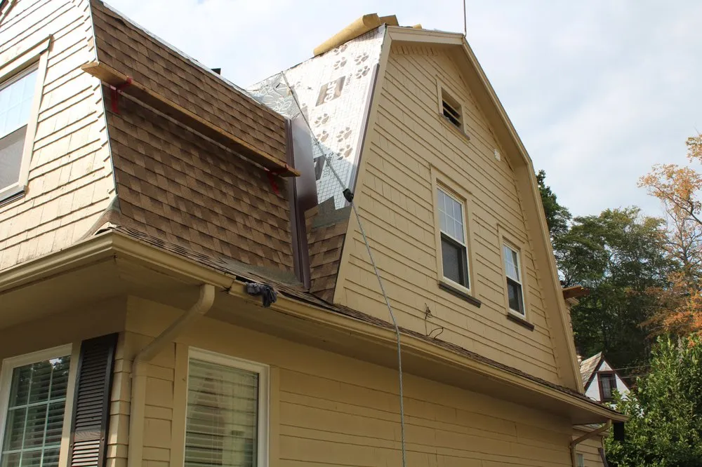 Slide of When It Wayne's Roofing Company