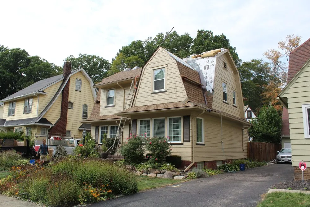 Slide of When It Wayne's Roofing Company