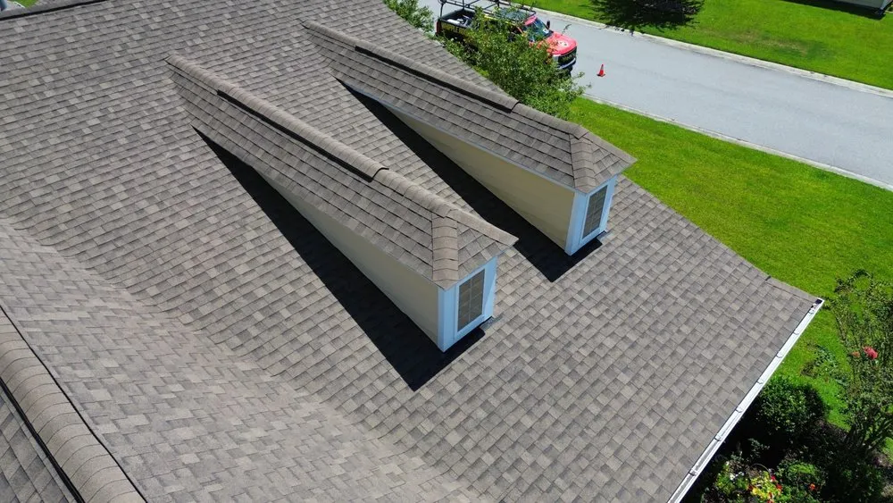 Slide of Whipple Roofing