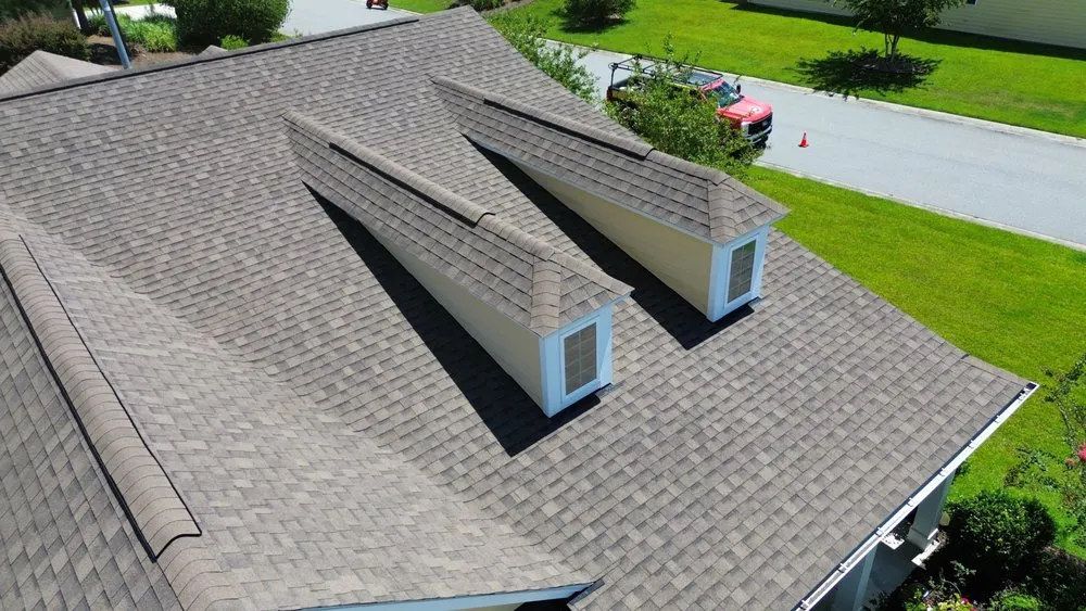 Slide of Whipple Roofing