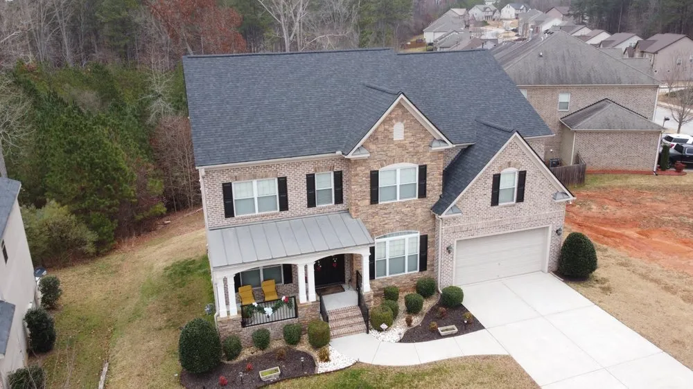 Slide of Whitaker Roofing Company