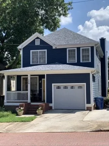 Slide of Whitaker Roofing Company