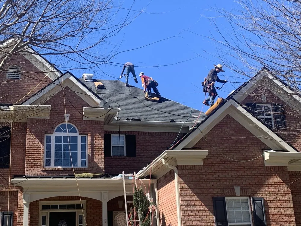 Slide of Whitaker Roofing Company
