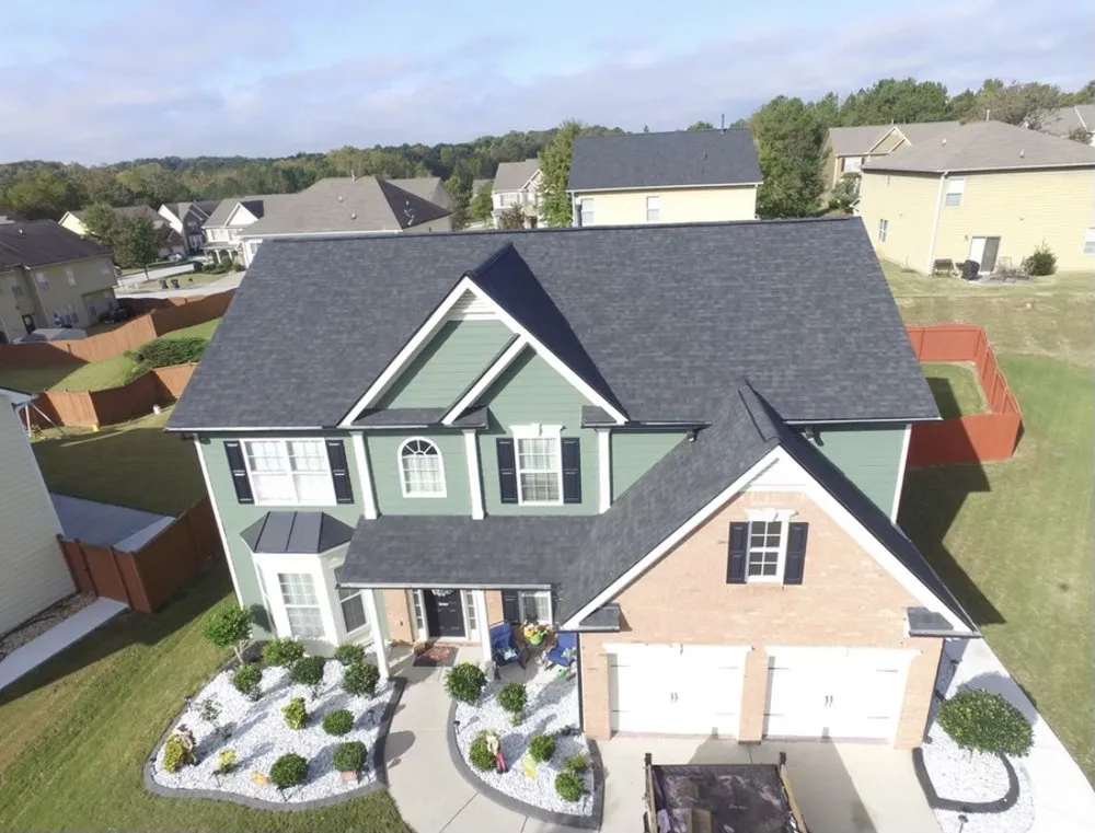 Slide of Whitaker Roofing Company