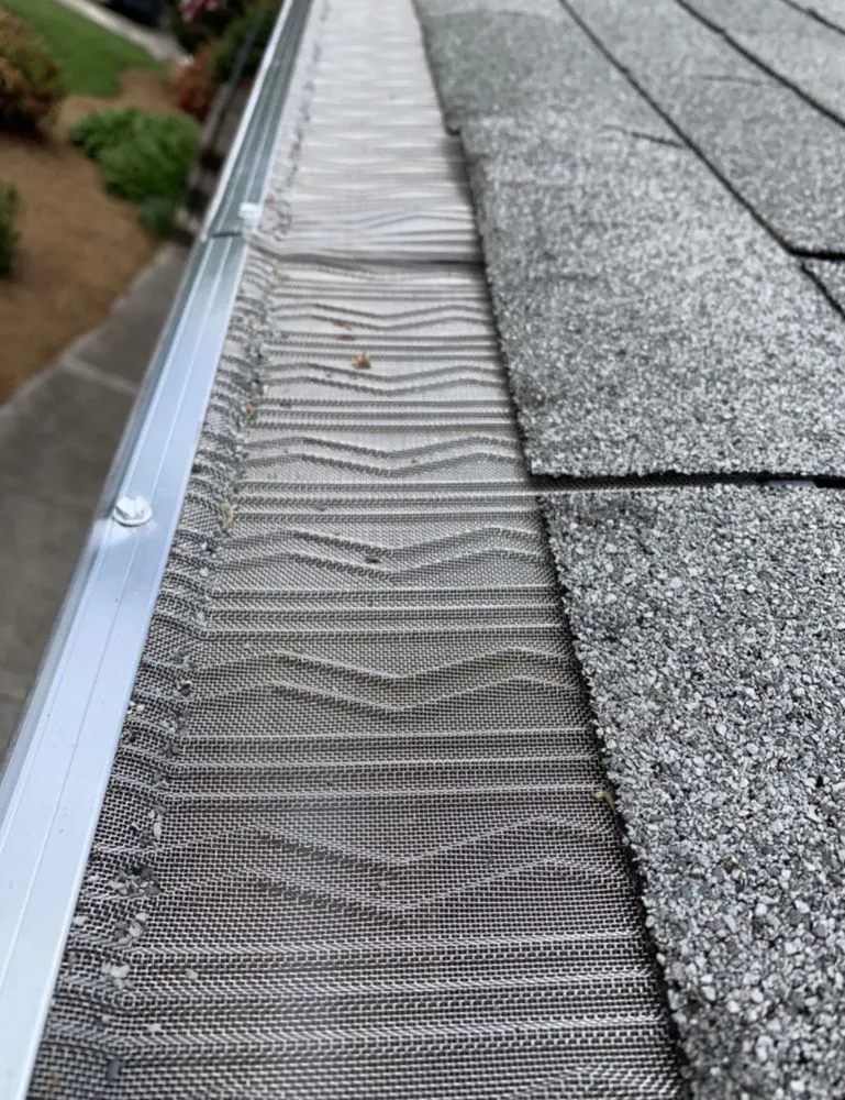 Slide of Whitaker Roofing Company