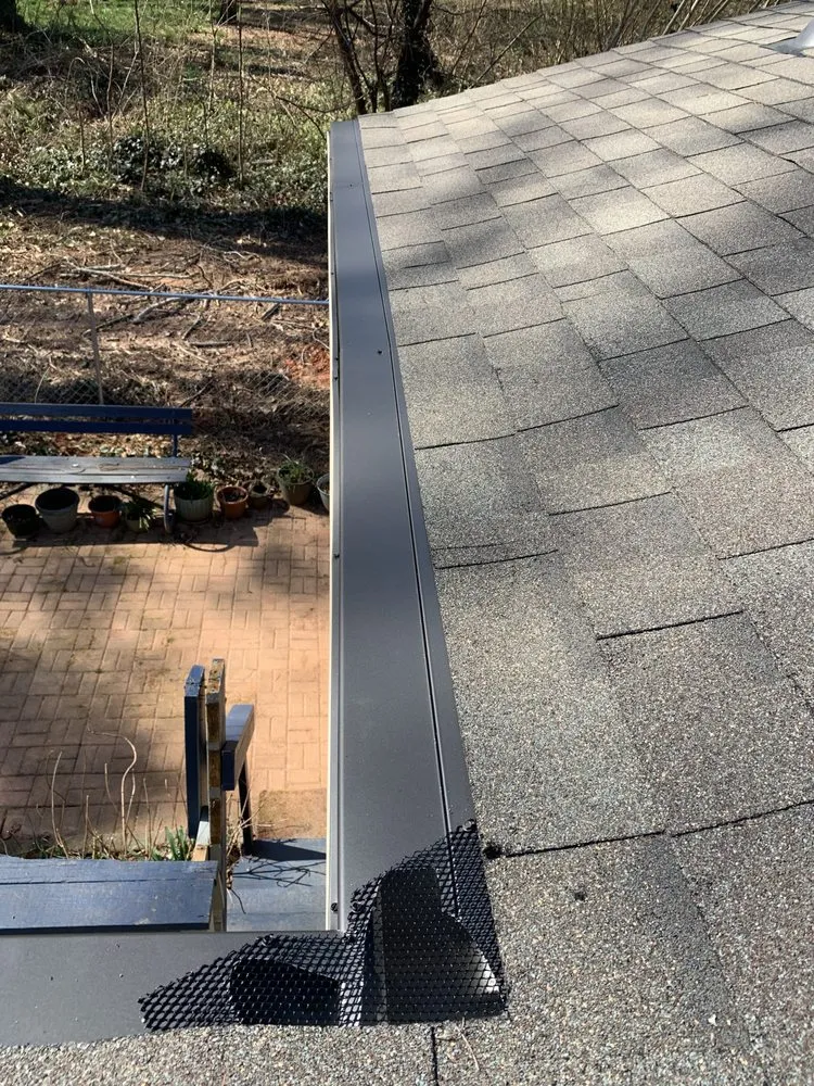 Slide of Whitaker Roofing Company