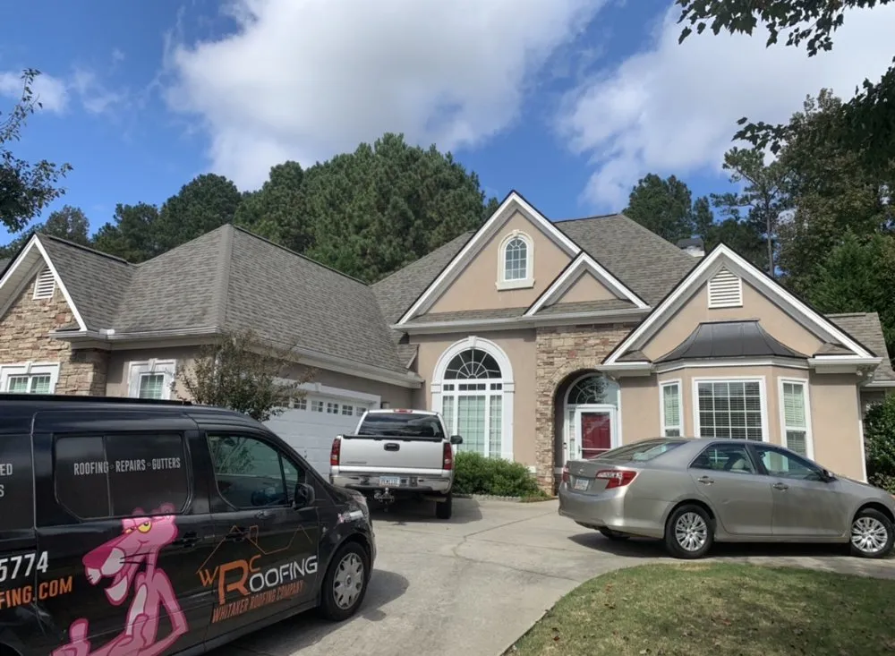 Slide of Whitaker Roofing Company