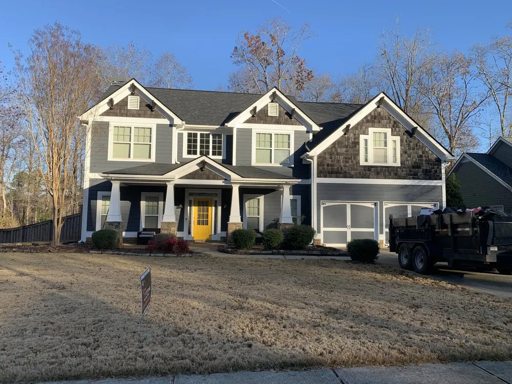 Slide of Whitaker Roofing Company