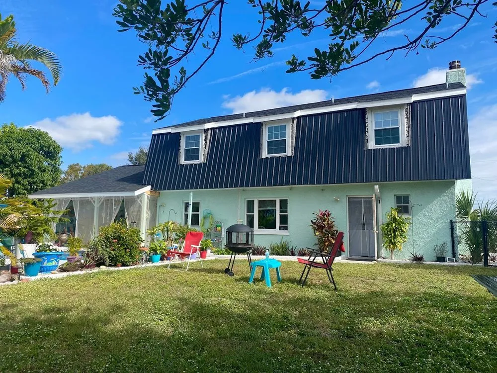 Slide of Whitby Roofing