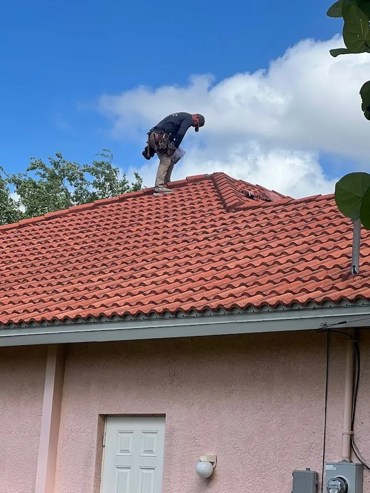 Slide of Whitby Roofing
