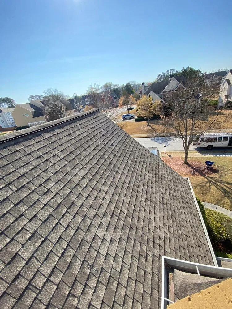 Slide of Whitby Roofing Service