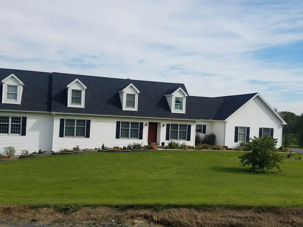 Slide of White & Sons Roofing