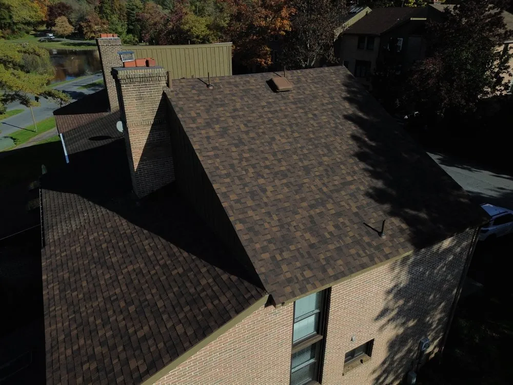 Slide of White & Sons Roofing