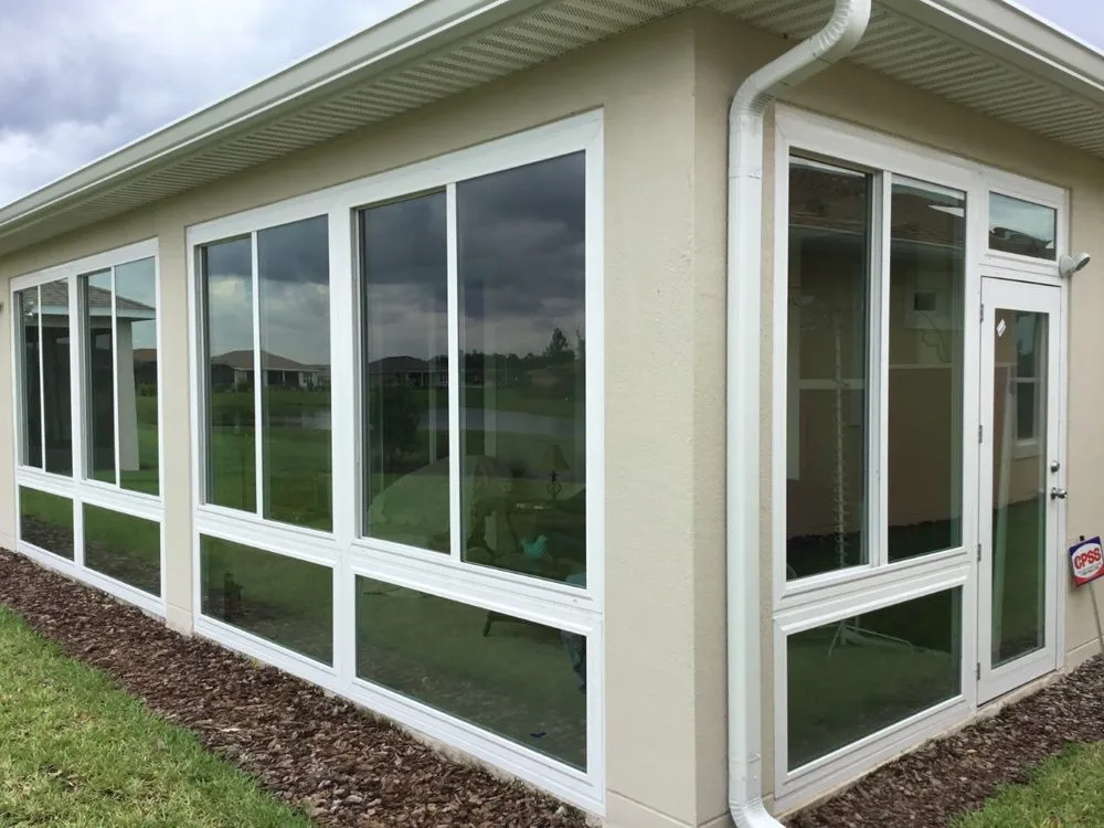Slide of White Aluminum & Windows