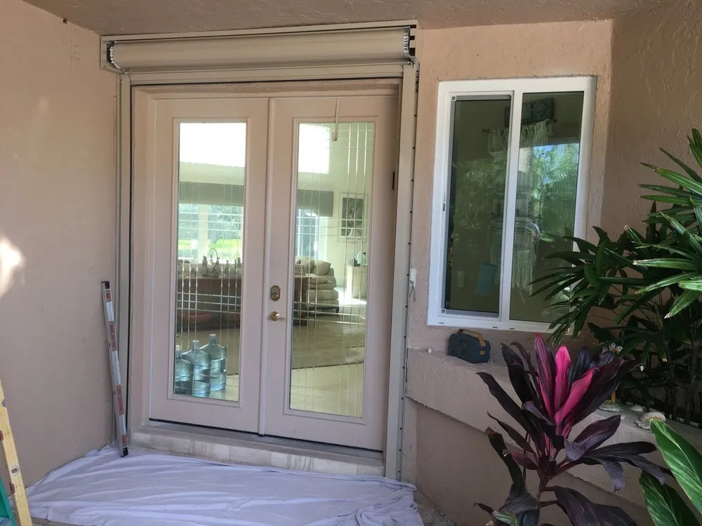 Slide of White Aluminum and Windows