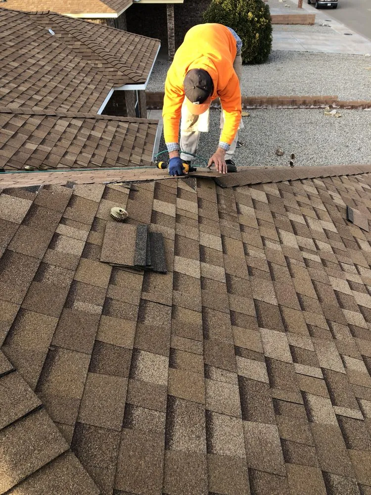 Slide of White Mountain Roofing