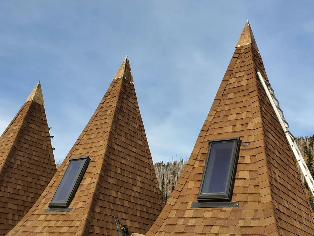 Slide of White Mountain Roofing