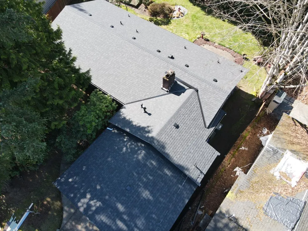 Slide of White Sky Roofing