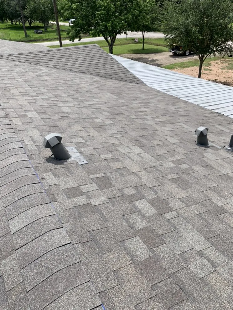 Slide of White Star Roofing