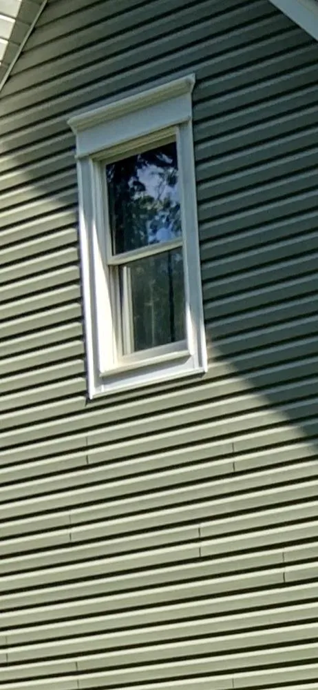 Slide of Whitehouse Roofing & Window