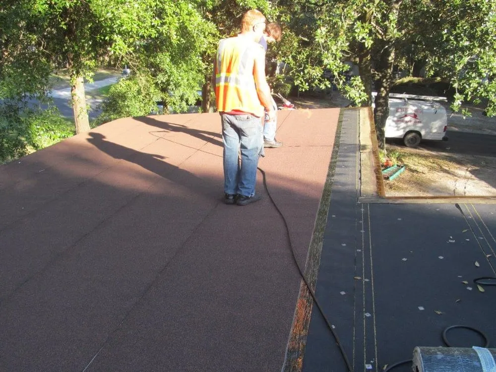 Slide of White's Roofing Company