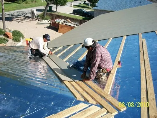 Slide of White's Roofing Company