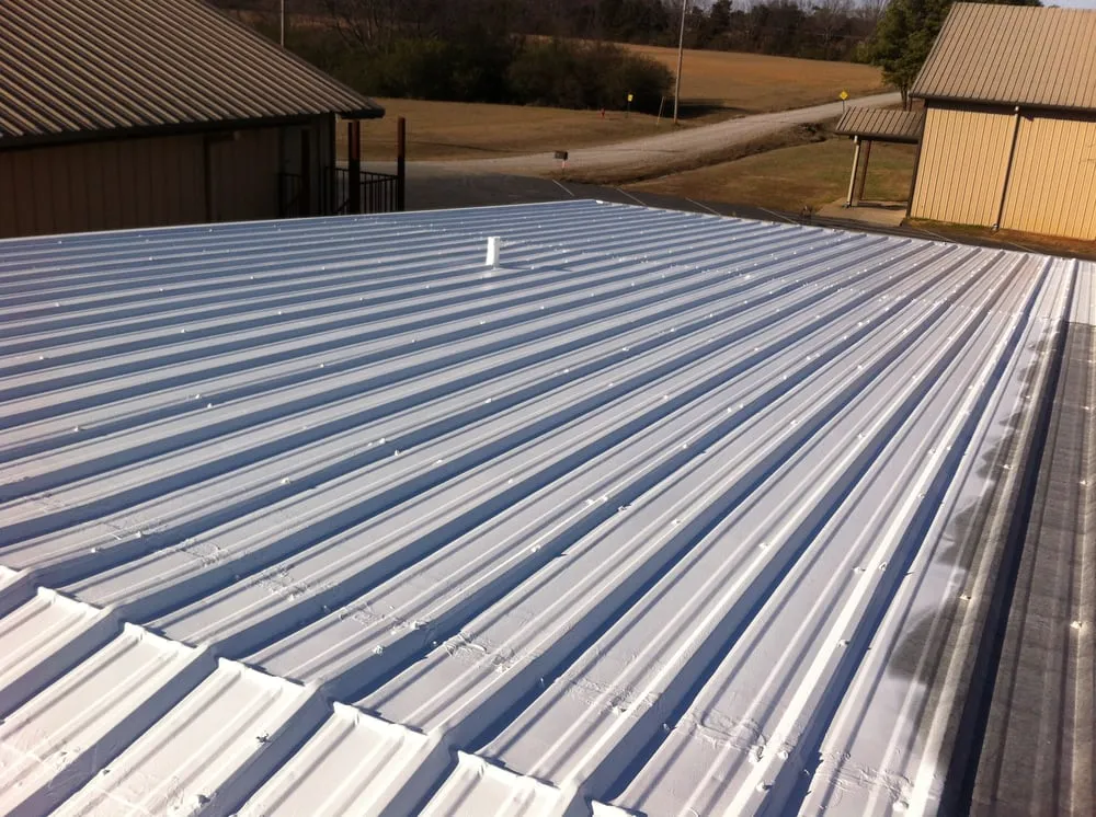 Slide of White's Roofing Company