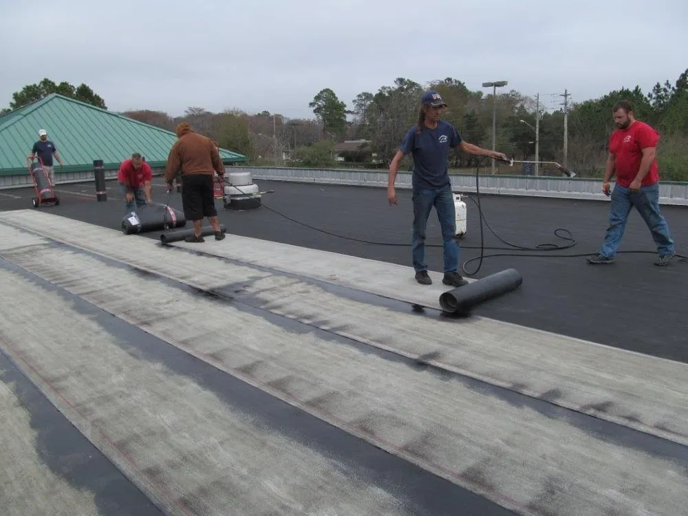Slide of White's Roofing Company