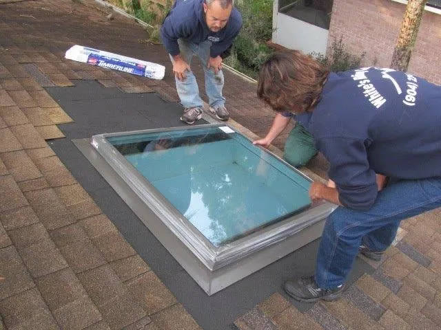 Slide of White's Roofing Company