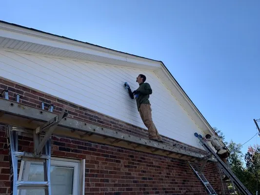 Whitetail Home Improvements & Seamless Gutters Logo