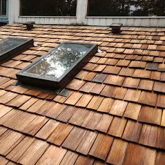 Slide of Whitman's Roofing