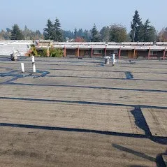 Slide of Whitman's Roofing