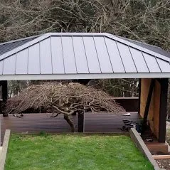 Slide of Whitman's Roofing