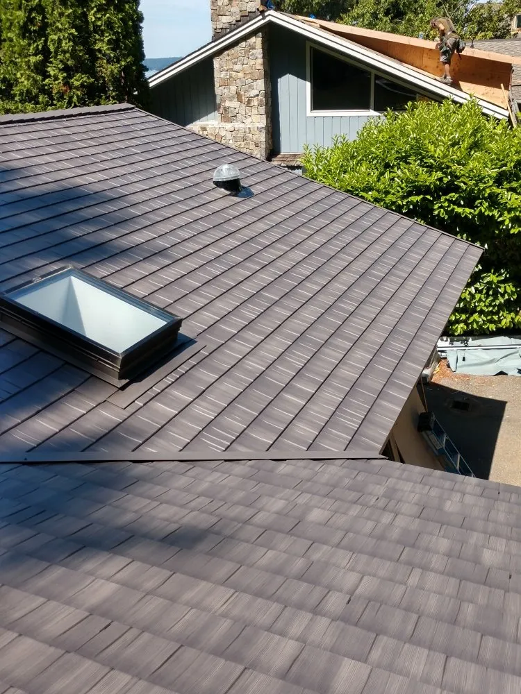 Slide of Whitman's Roofing