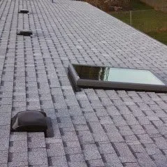 Slide of Whitman's Roofing