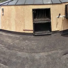 Slide of Whitman's Roofing