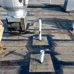 Slide of Whitman's Roofing