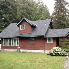 Slide of Whitman's Roofing