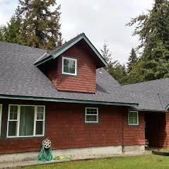 Slide of Whitman's Roofing