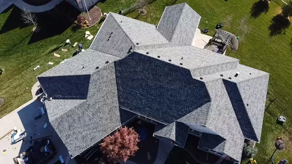 Slide of Whitney Roofing