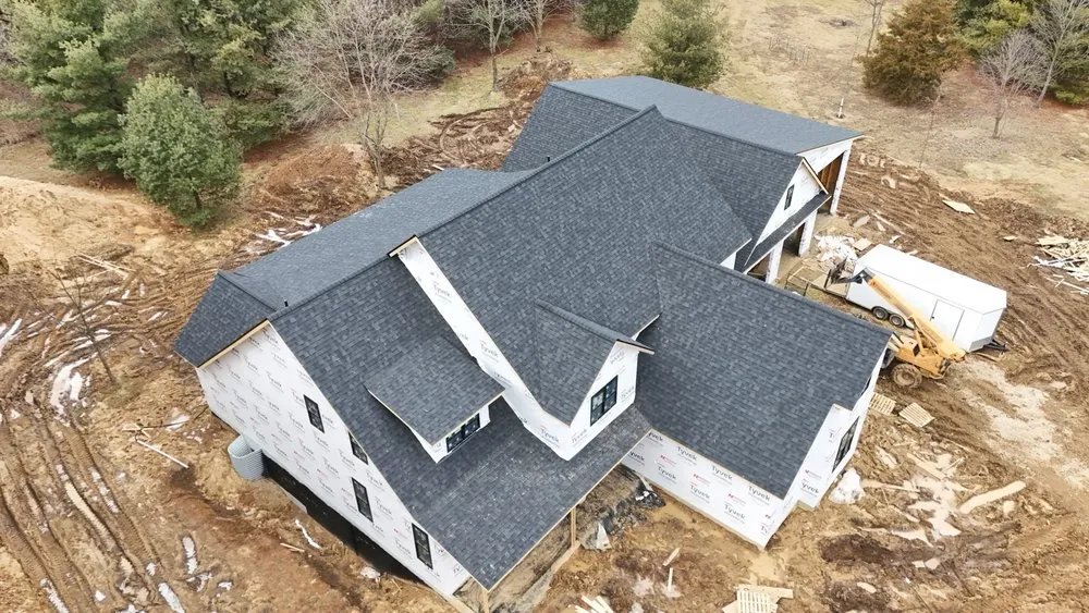 Slide of Whitney Roofing
