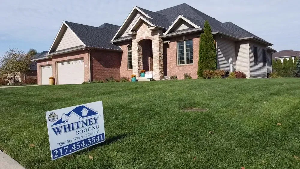 Slide of Whitney Roofing