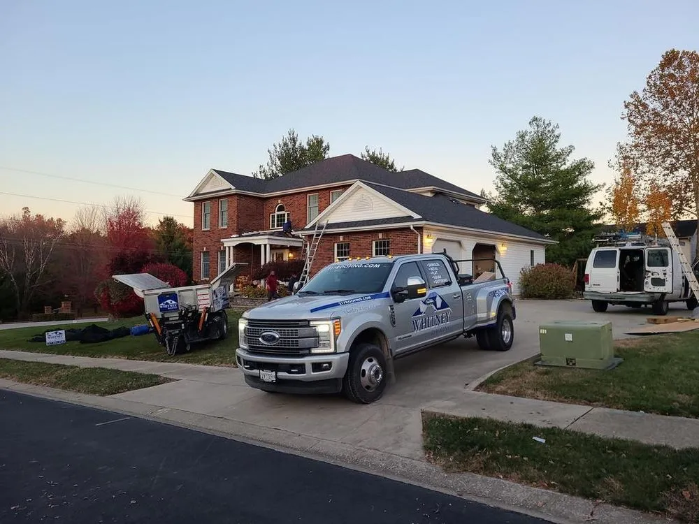 Slide of Whitney Roofing