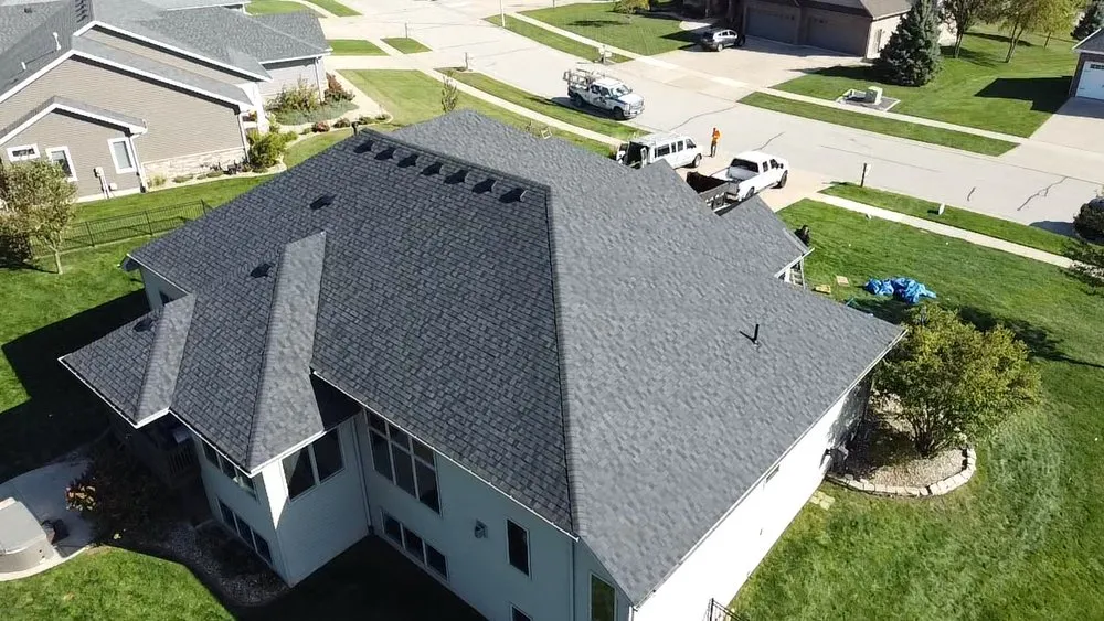 Slide of Whitney Roofing