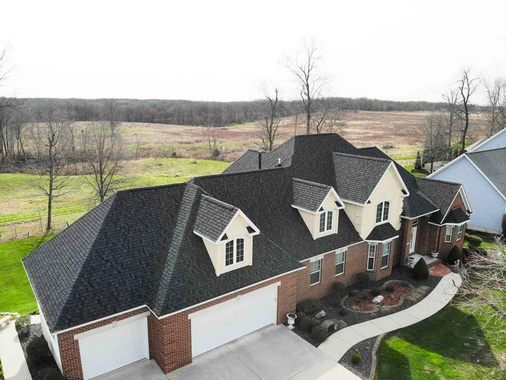 Slide of Whitney Roofing