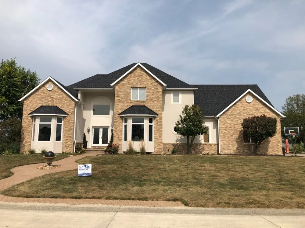 Slide of Whitney Roofing