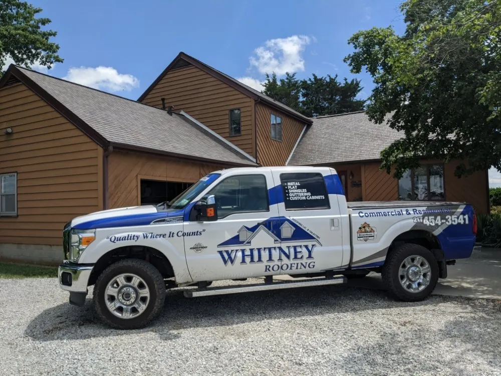 Slide of Whitney Roofing