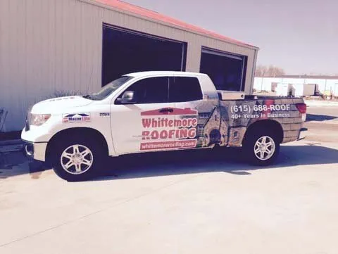 Slide of Whittemore Roofing