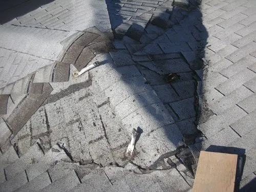 Slide of Whittle's Roofing