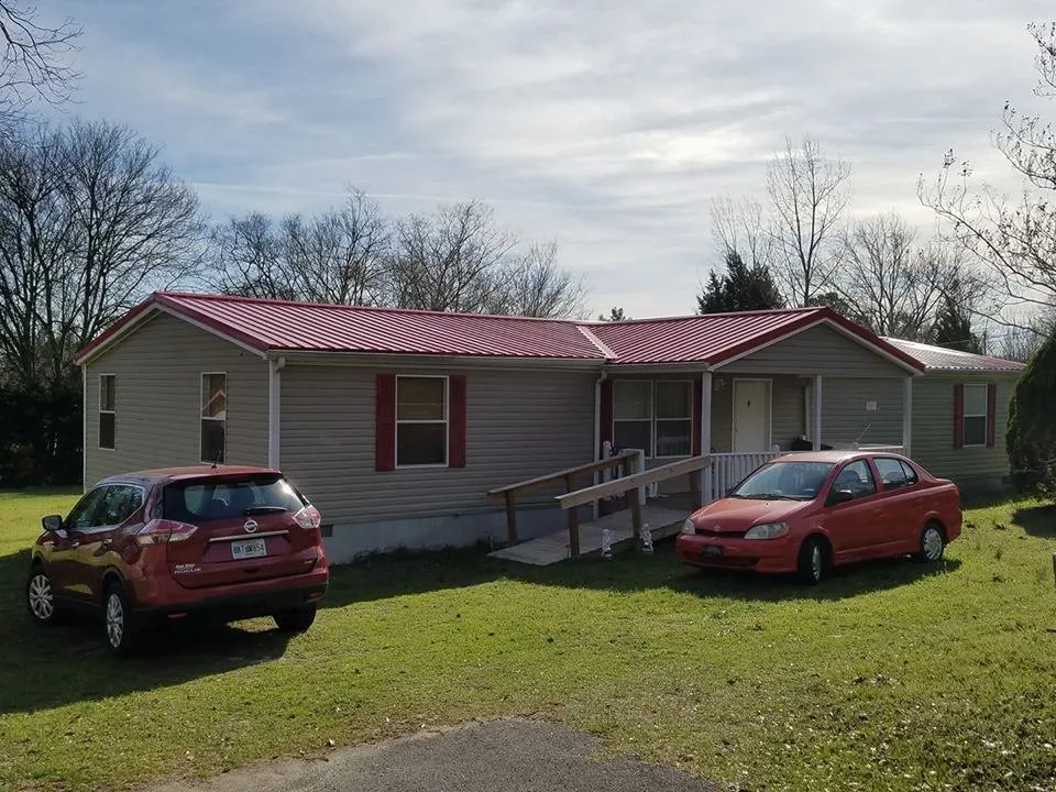 Slide of Whitt's Quality Roofing